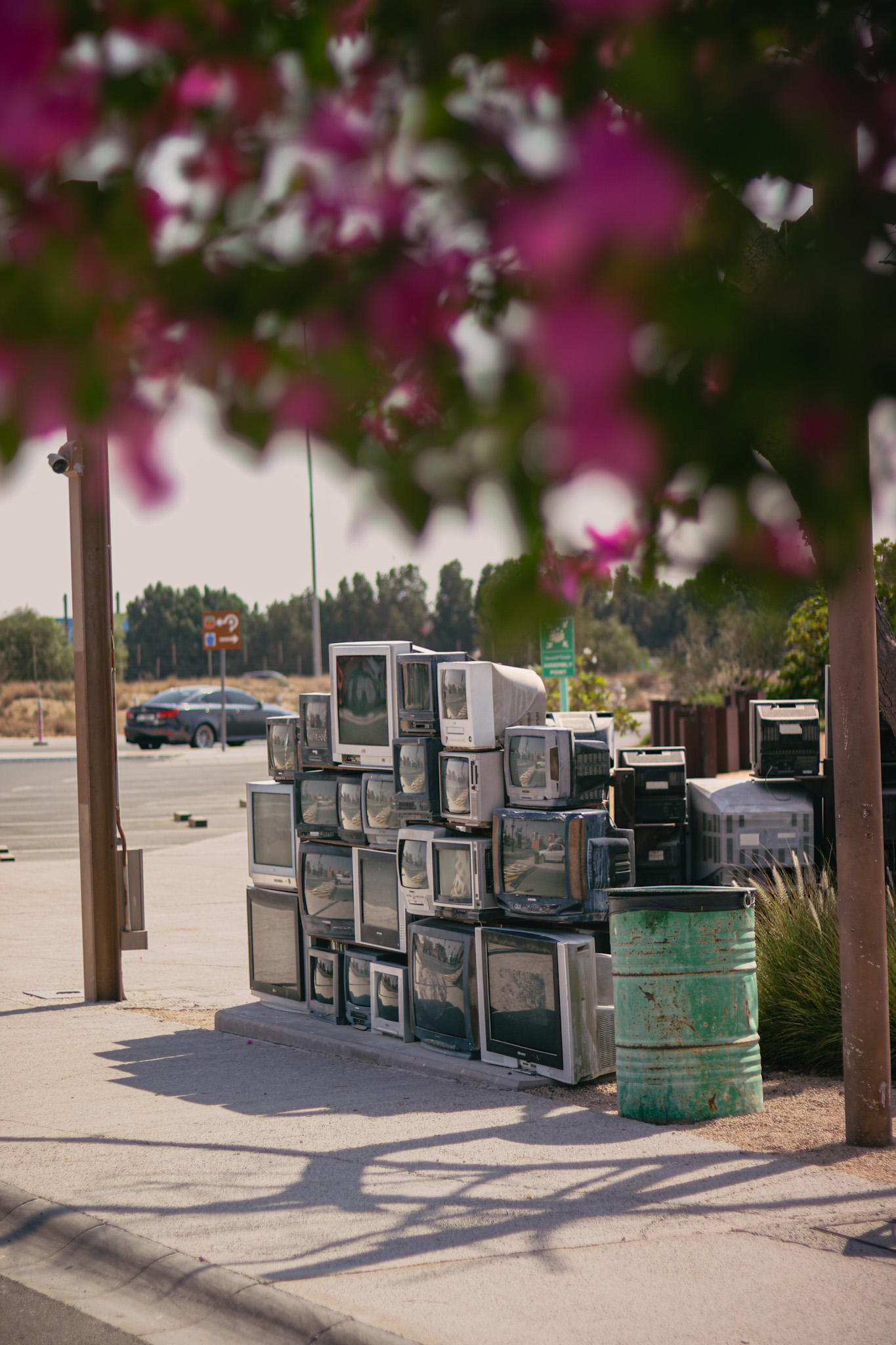 A stack of antique television sets
