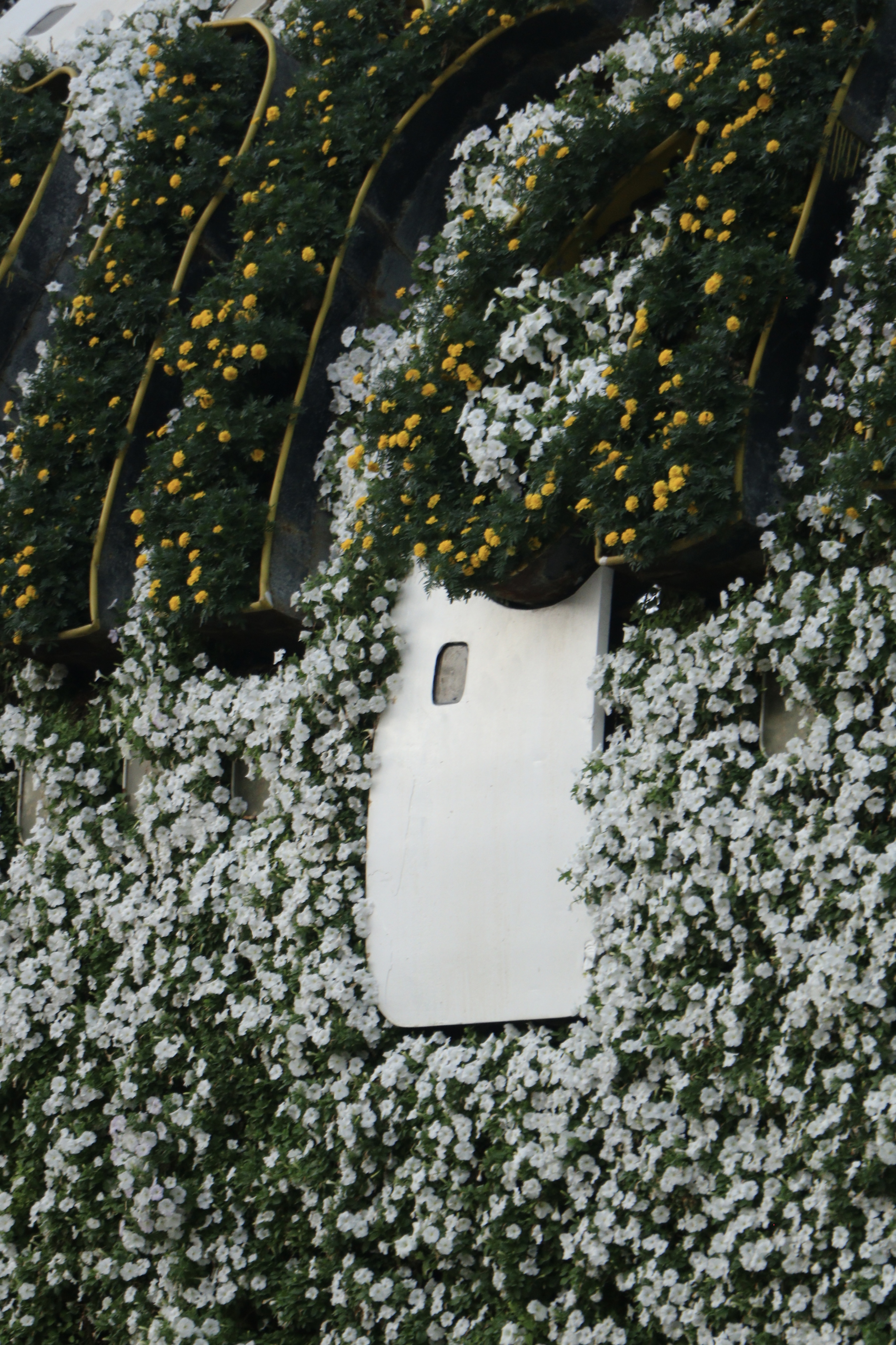 A doorway decorated with flowers